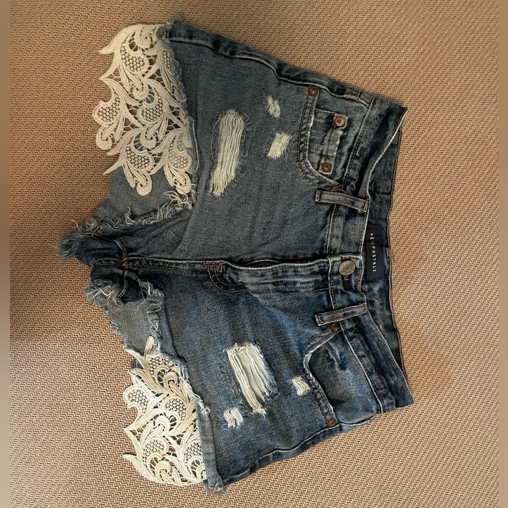 Denim shorts with embroidery pocket details, high rise. BOHO core shorts.